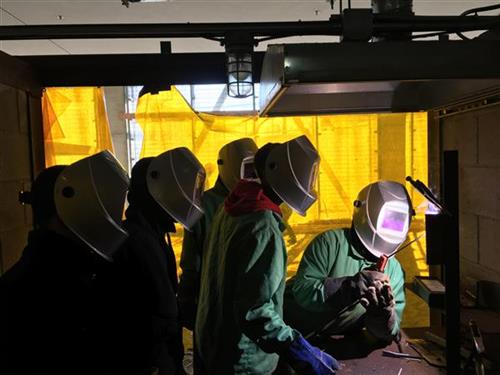Students involved in welding Students involved in welding